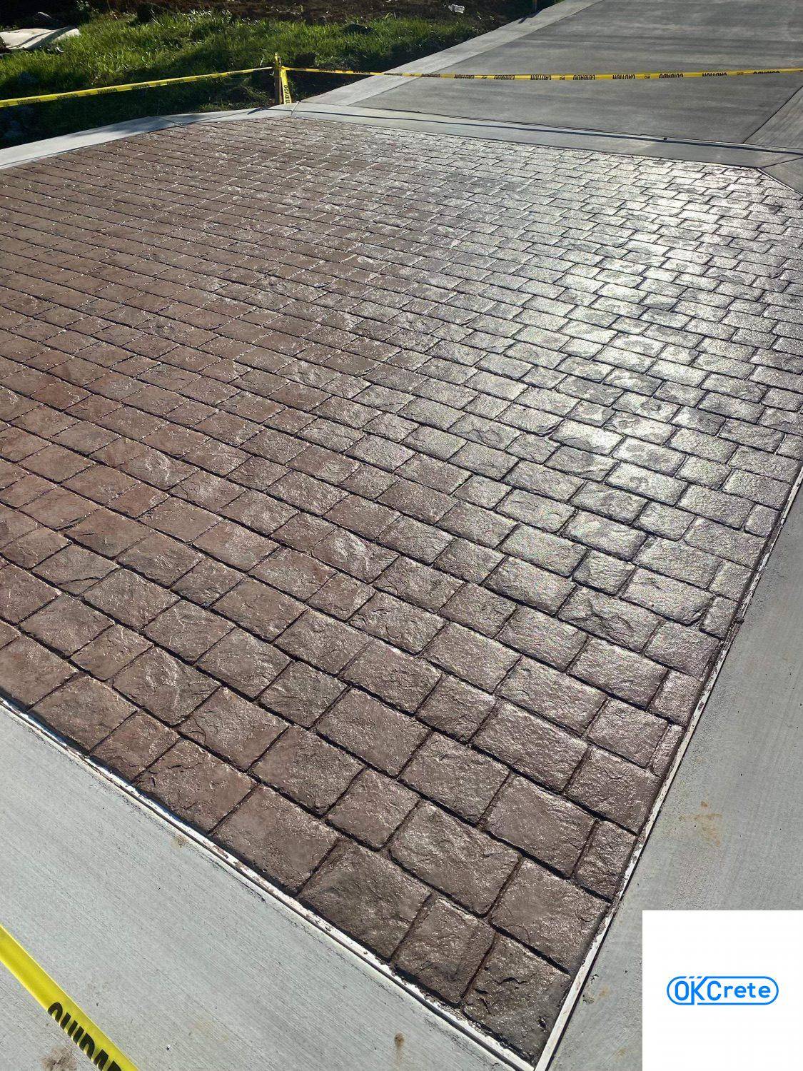 2021 06 17 Midtown Brick Colored Stamped Concrete Driveway IMG 5326