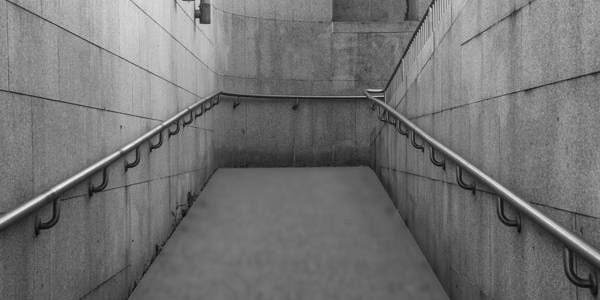 Concrete Ramp with Concrete Walls and ADA Railings Ramp Slope